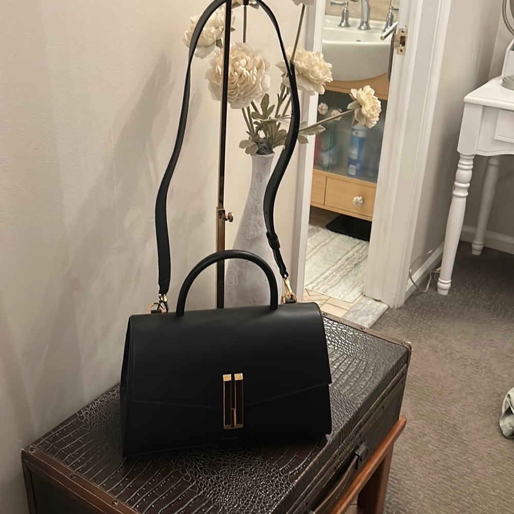 DEMILLIER London (The Montreal Bag) in black smooth.